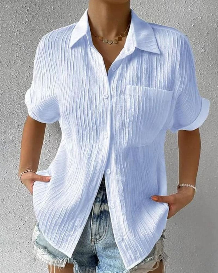 Roarama | Blouse unie à manches courtes avec une poche