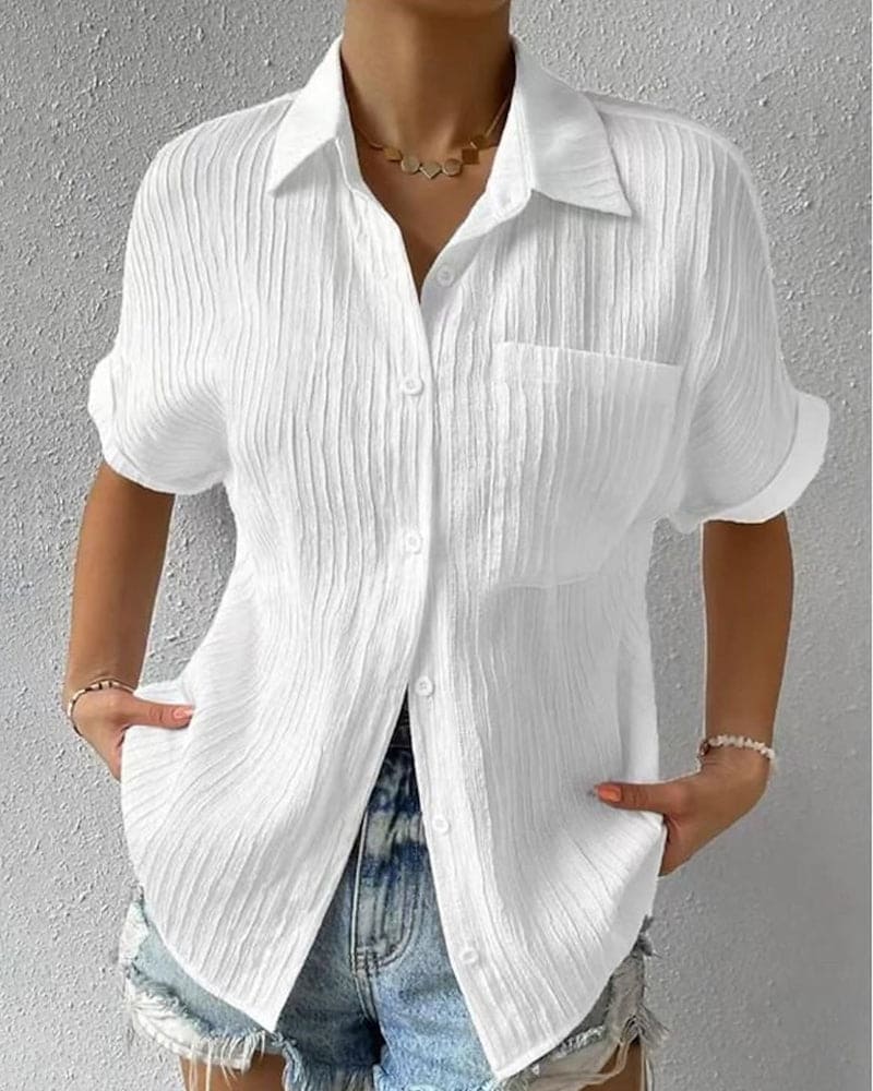 Roarama | Blouse unie à manches courtes avec une poche