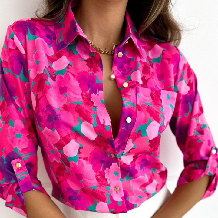 Chemise-blouse rose rouge pour femme avec imprimé abstrait coloré, col classique et manches retroussées