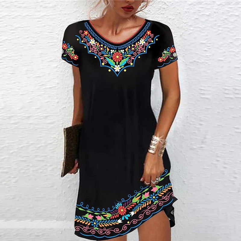 Robe élégante noire pour femme avec détails brodés multicolores, manches courtes et finition décorative au col et à l’ourlet