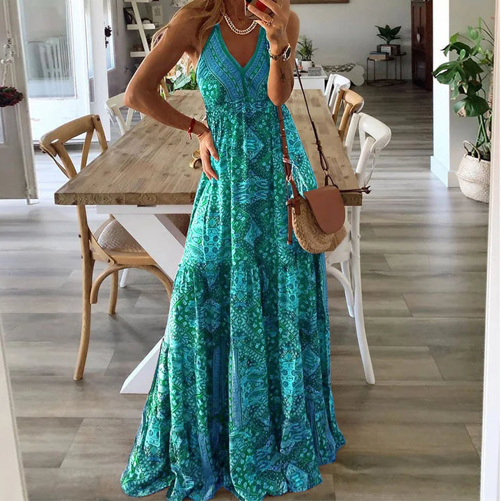 Robe imprimée fleurie vert pour femme avec coupe longue bohème, décolleté en V et silhouette élégante
