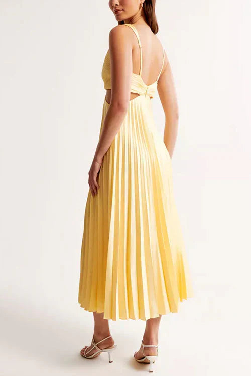 Vue arrière d’une robe midi jaune pour femme avec jupe fluide et coupe féminine
