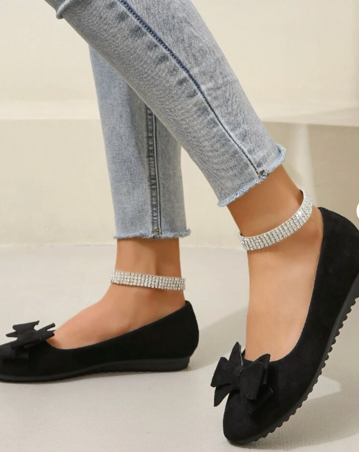 Sandales orthopédiques noir pour femme avec nœud décoratif, semelle souple et style féminin intemporel