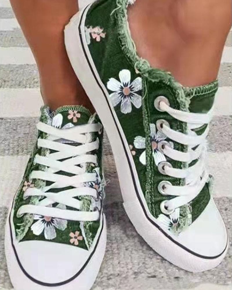 Baskets en denim vert pour femme avec imprimé floral blanc, lacets assortis et look casual confortable