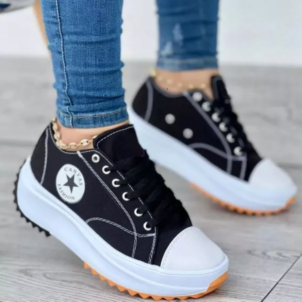 Baskets modernes Neelleana noires vues de côté, baskets femme tendance à semelle épaisse
