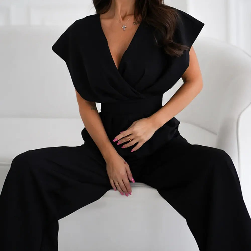 Combinaison noir pour femme avec coupe ample, jambes larges et style chic pour les occasions spéciales