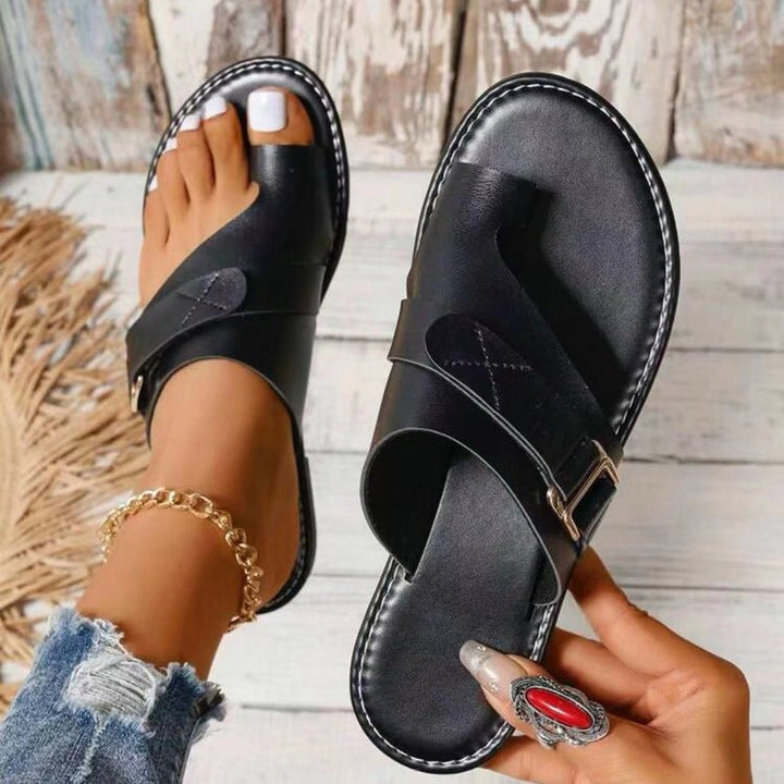 Sandales orthopédiques noir pour femme avec bride croisée, bout ouvert et design confortable au quotidien
