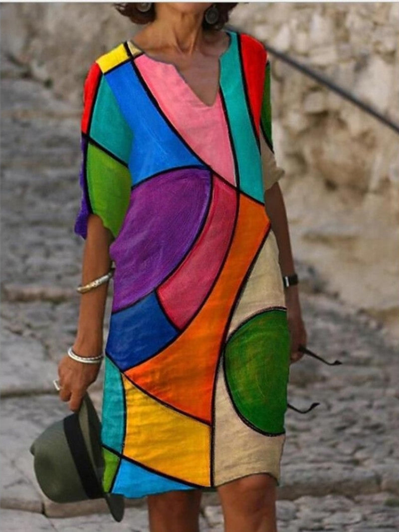 Robe élégante multicolore pour femme avec motif géométrique abstrait, coupe fluide et style original