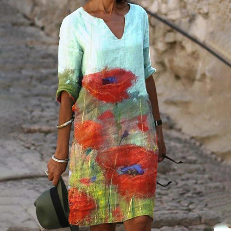 Robe élégante turquoise pour femme avec imprimé floral rouge et orange, manches trois-quarts et coupe confortable