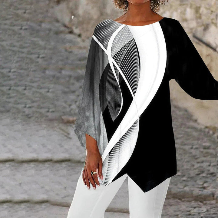 Tunique moderne géométrique noir et blanc pour femme avec manches longues, imprimé abstrait contrasté et coupe fluide élégante