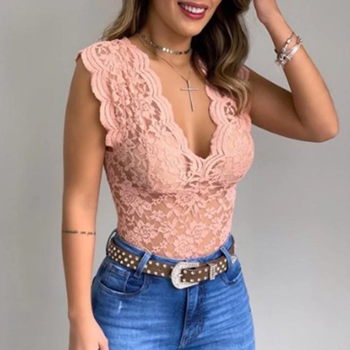 Blouse sans manches rose pour femme avec dentelle florale, décolleté en V profond et coupe ajustée élégante