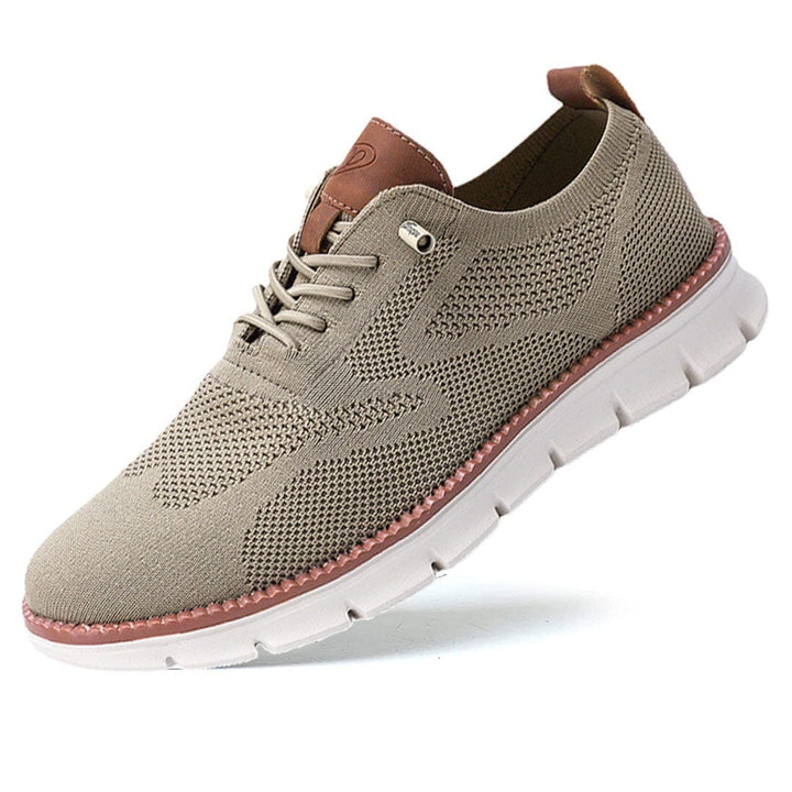 Baskets gris pour homme avec maille respirante, semelle blanche et style casual moderne