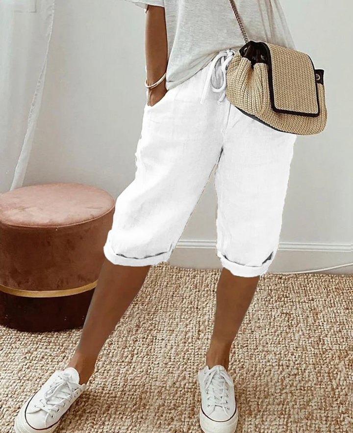 Short en lin blanc pour homme avec taille confortable, coupe ample et style élégant pour l’été